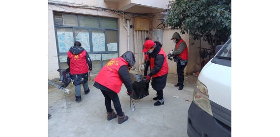武汉黄陂区城管联合多部门开展“清洁家园与爱卫同行”志愿服务活动